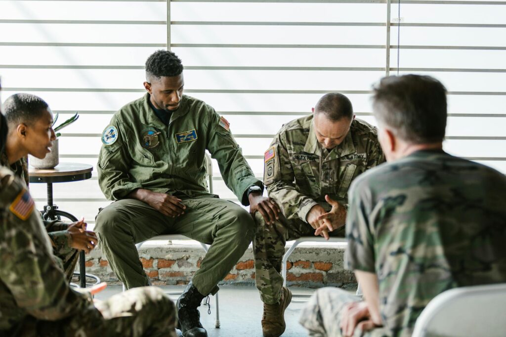 photo of men supporting each other